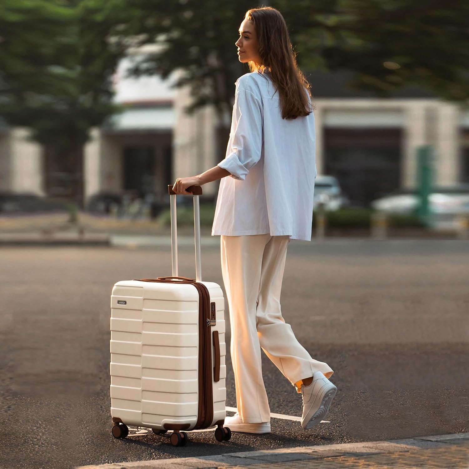 Vipbox hardside luggage being wheeled along a street