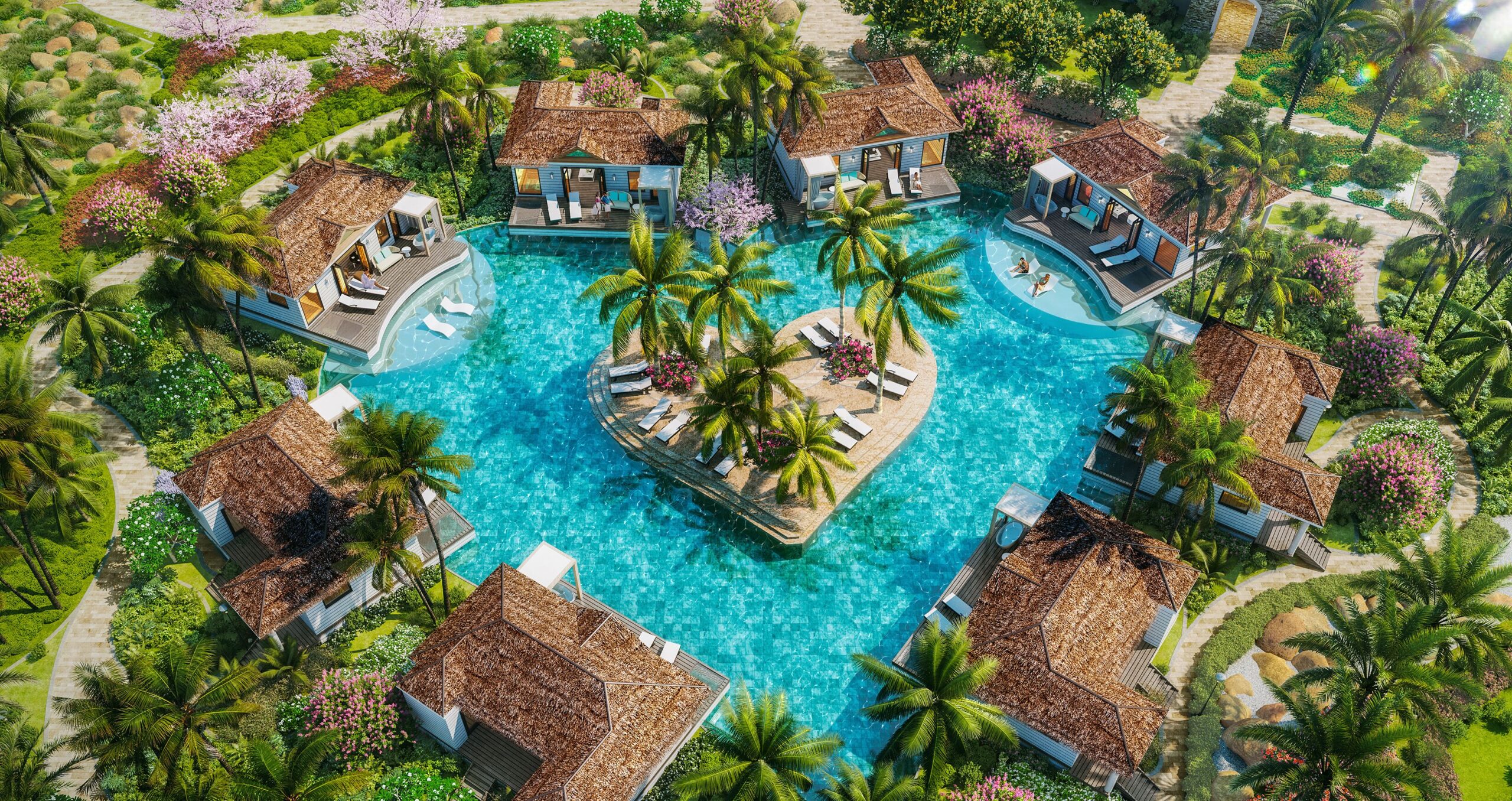 Aerial view of the heart-shaped pool and island suites at Sandals Royal Curaçao