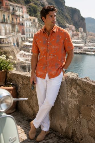 Man wearing the bohio nautical print shirt in rust orange above a harbour
