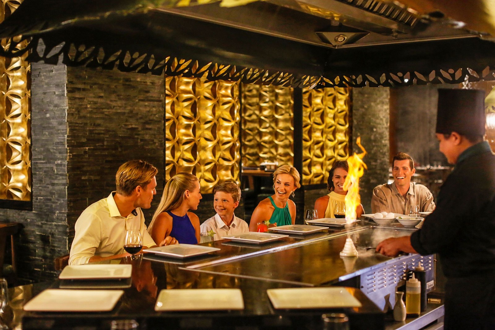 Guests at the teppanyaki table at Momo restaurant, Moon Palace Cancún