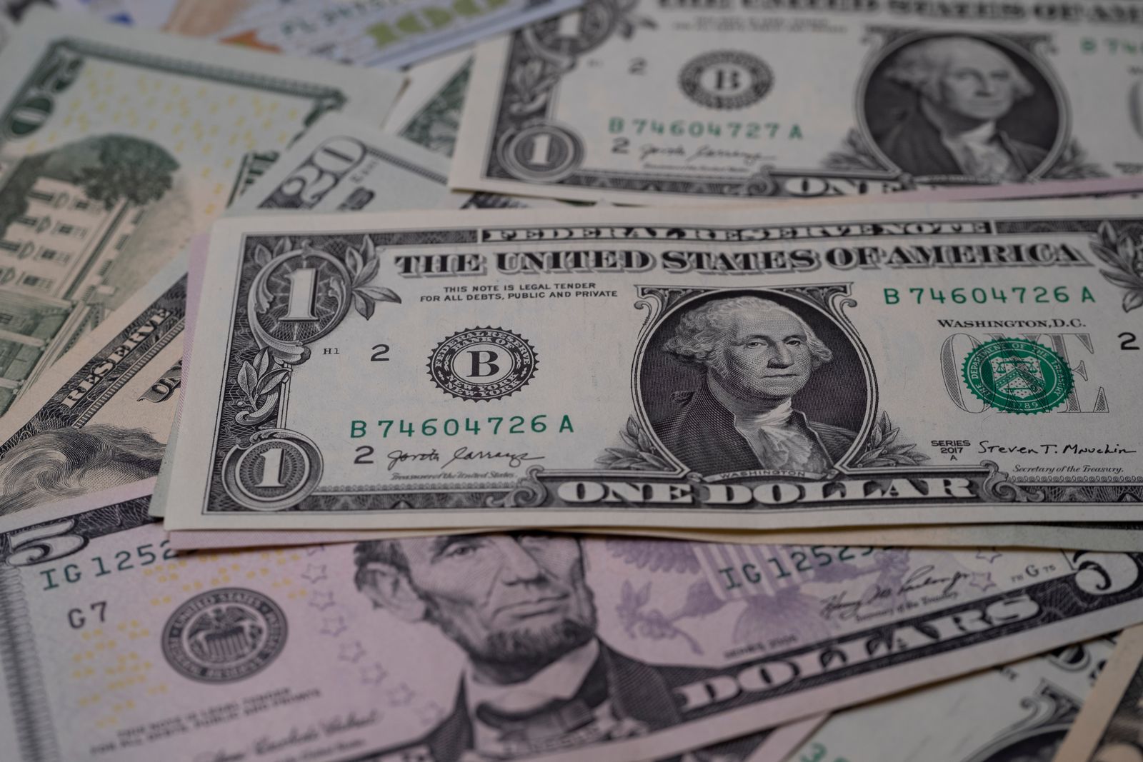 US one and five dollar bills, the small bills to bring for tipping at all-inclusive resorts